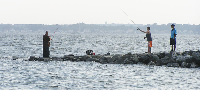 Photo of people fishing on the bay
