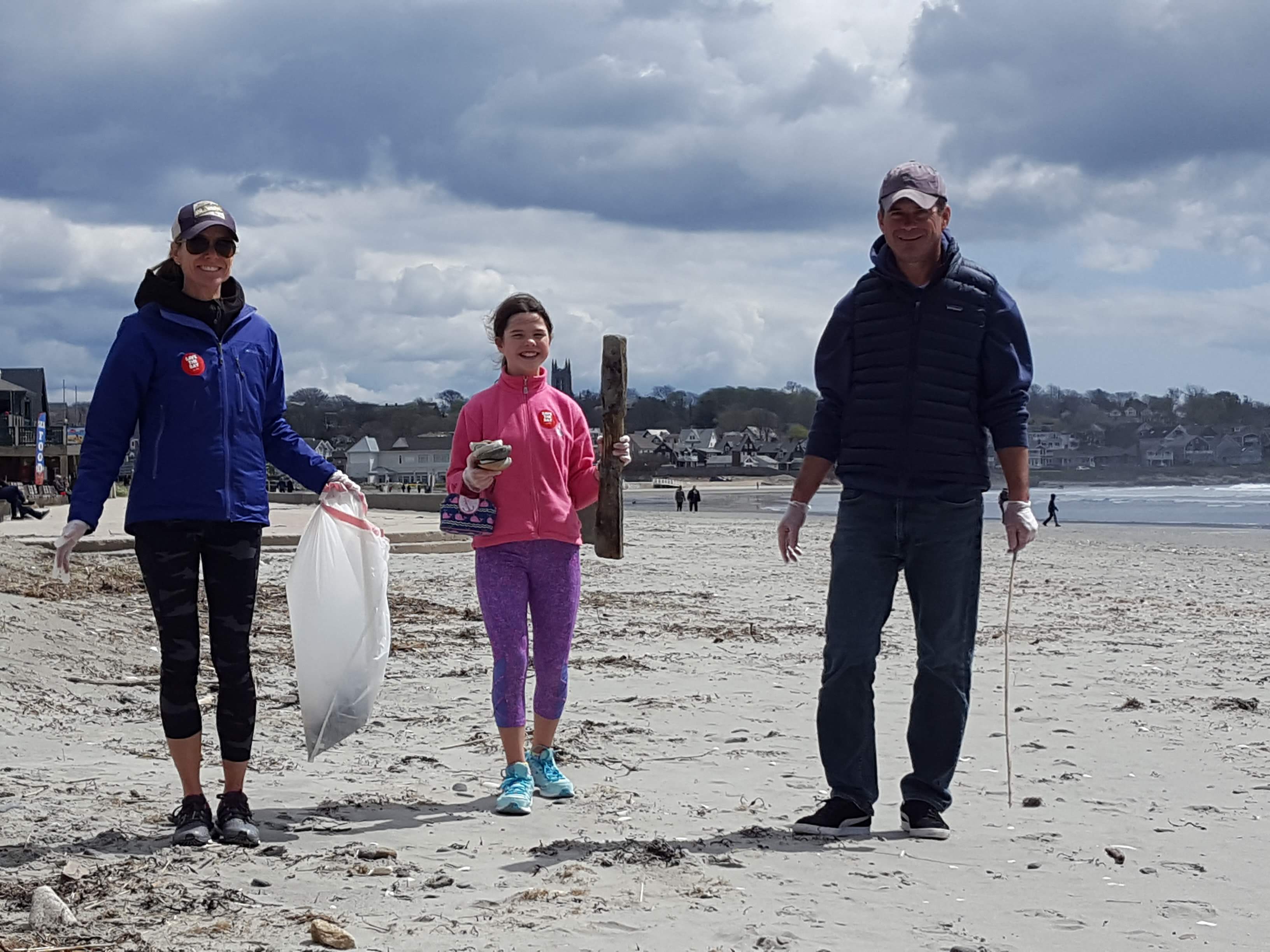 Volunteers picking up trash at Easton's Beach