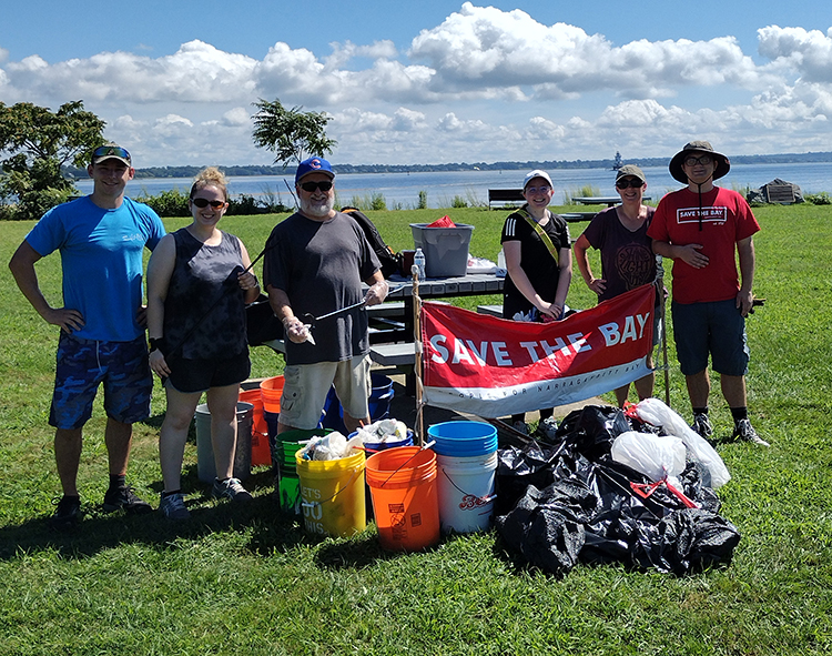 Volunteers-with-collected-litter-cleanup-Conimicut-Point-Warwick