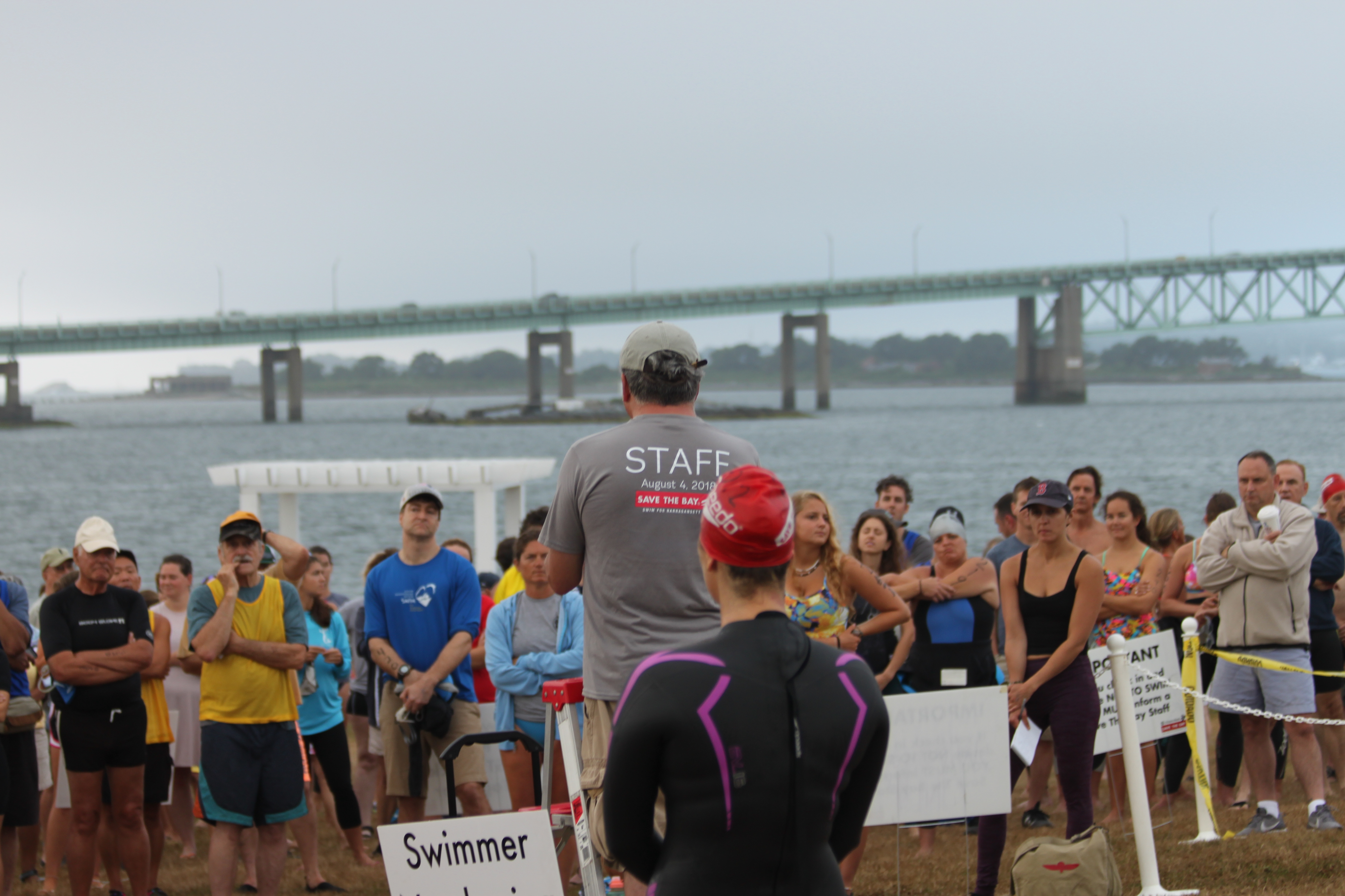 Save The Bay's Topher Hamblett gives the 2018 Swim safety speech.